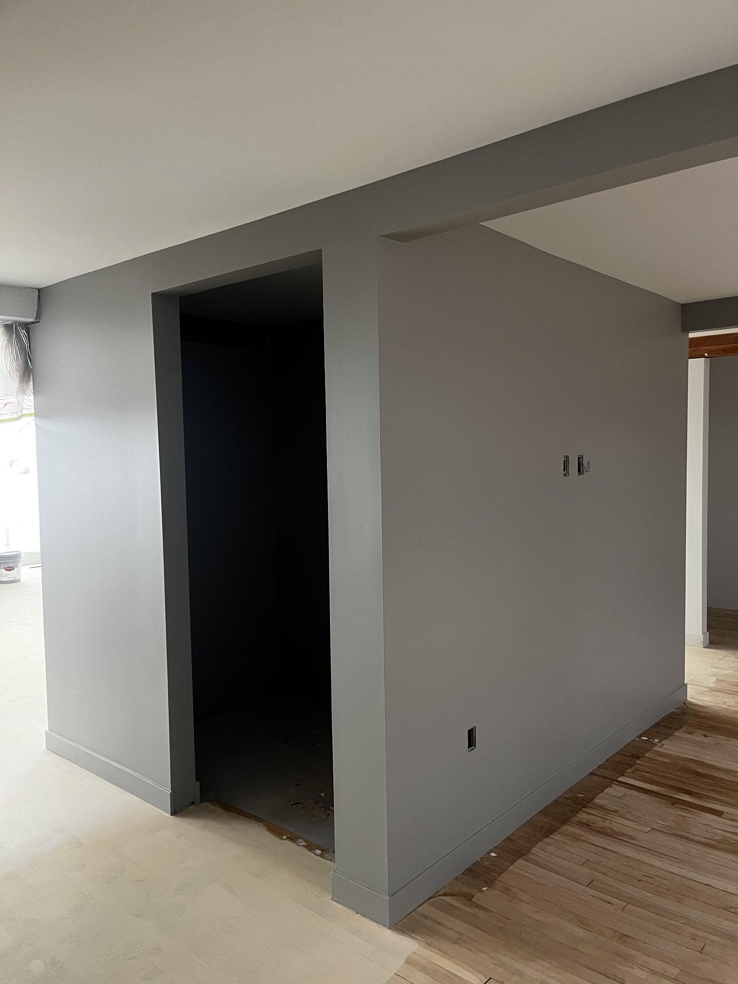 Painted gray interior walls around a doorway