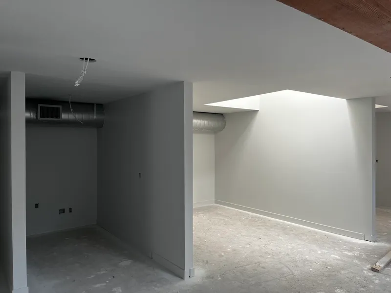 Freshly painted gray interior walls and ceiling